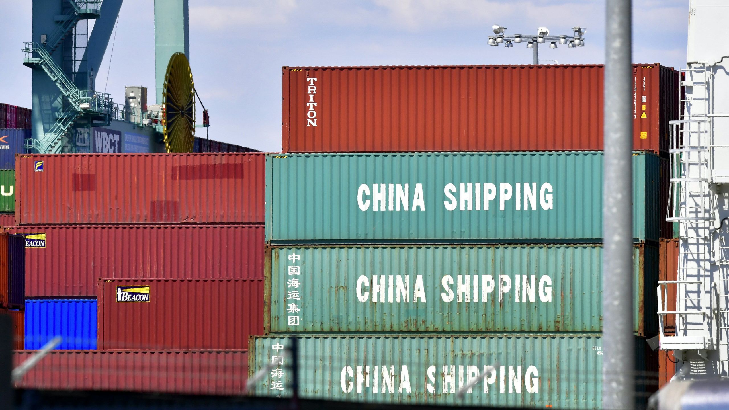 Containers are stacked on a vessel at the Port of Long Beach on July 6, 2018, including some from China Shipping, a conglomerate under the direct administration of China's State Council. (Credit: FREDERIC J. BROWN/AFP/Getty Images)