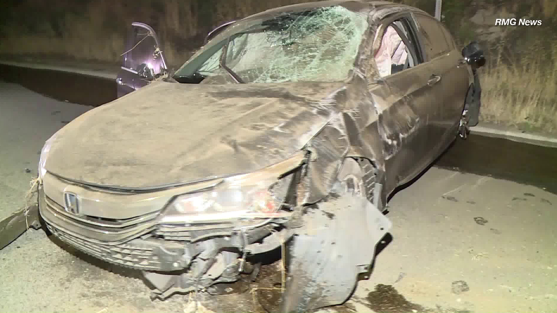 A Honda Accord is seen following a hit-and-run crash in Shadow Hills on May 8, 2019. (Credit: RMG News)