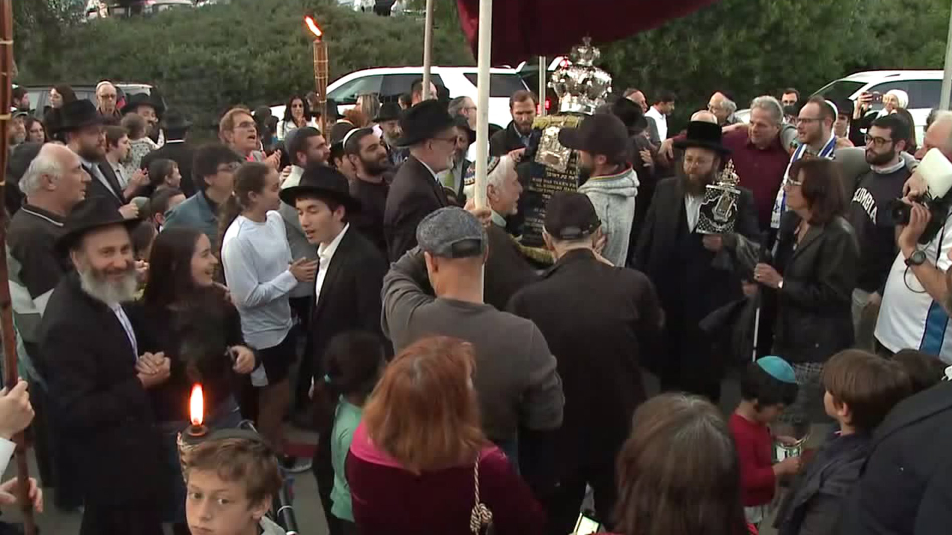 The Chabad of Poway community gathers at the synagogue on May 22, 2019, to honor Lori Kaye, who was killed in a shooting attack there the month before. (Credit: KSWB)