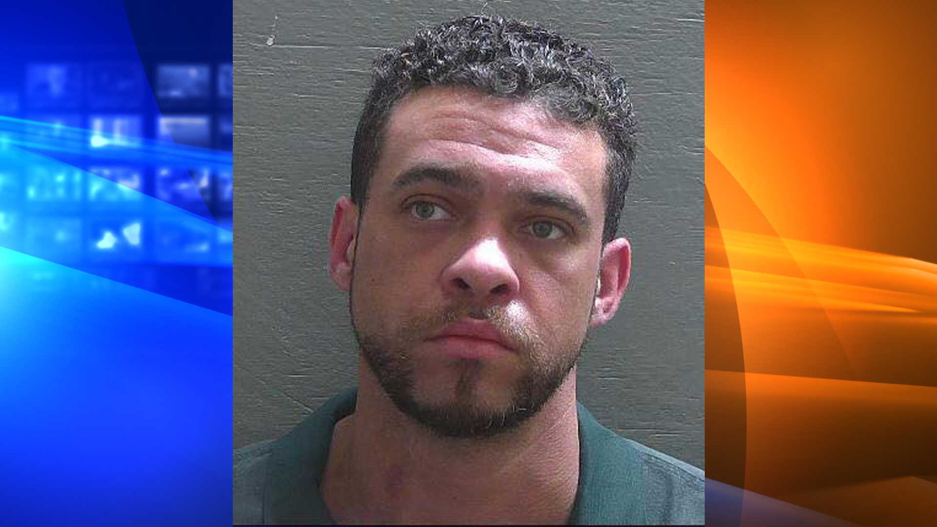 Andrew Bennett Ross Celaius is seen in a booking photo released by the Escambia County Sheriff's Office.