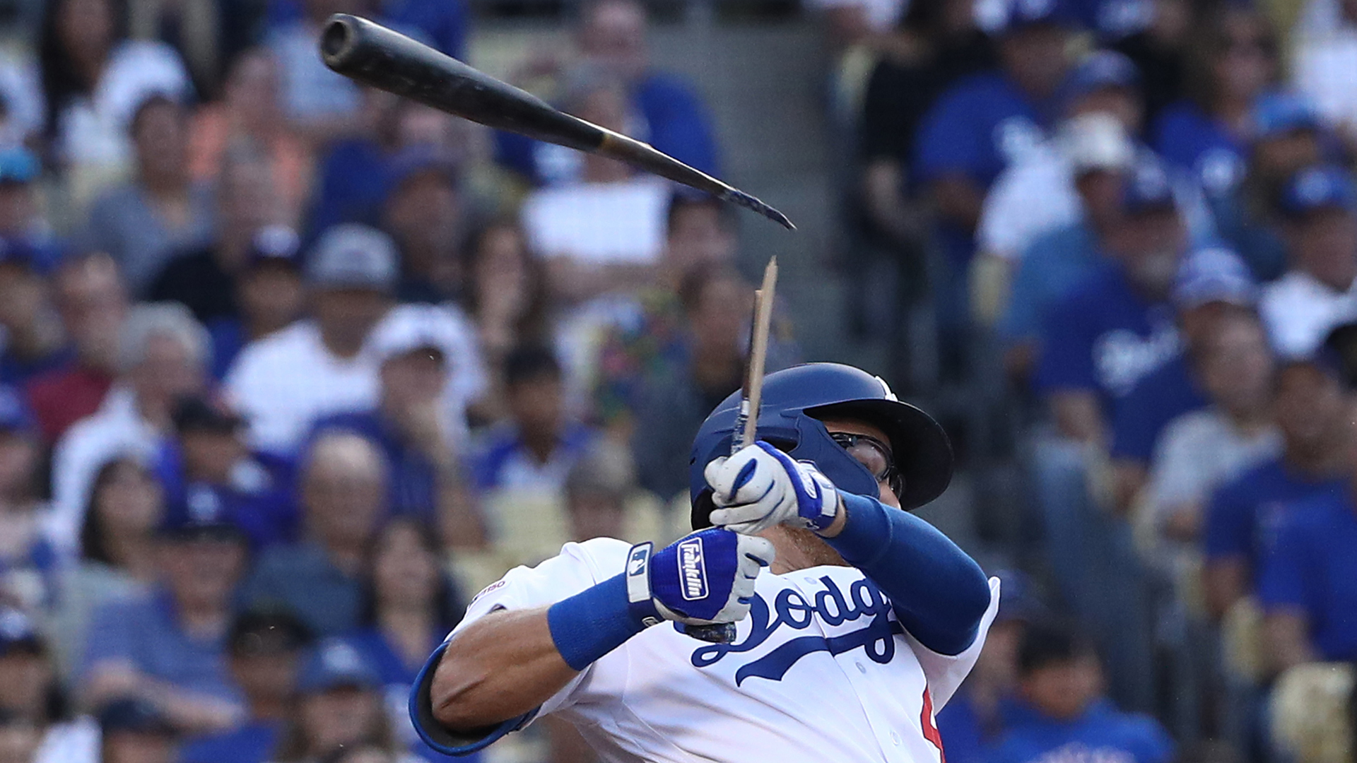 Matt Beaty #45 of the Los Angeles Dodgers breaks his bat on his swing in the fourth inning of the MLB game against the Chicago Cubs at Dodger Stadium on June 15, 2019 in Los Angeles, California. (Credit: Victor Decolongon/Getty Images)