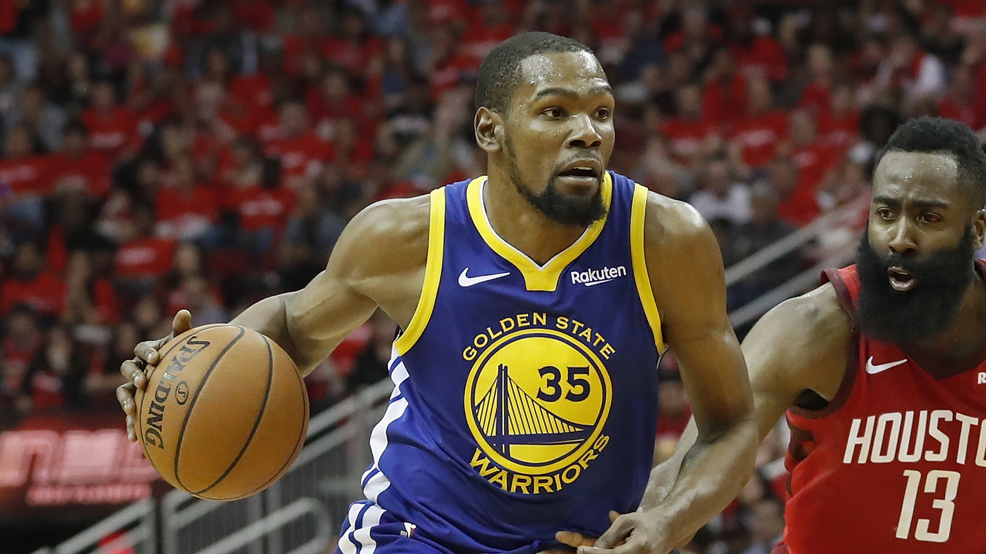 Kevin Durant #35 of the Golden State Warriors drives to the basket defended by James Harden #13 of the Houston Rockets in the second half during Game Three of the Second Round of the 2019 NBA Western Conference Playoffs at Toyota Center on May 4, 2019, in Houston, Texas. (Credit: Tim Warner/Getty Images)