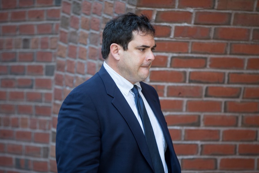 Stanford University sailing coach John Vandemoer arrives for his arraignment at Boston Federal Court on March 12, 2019 in Boston, Massachusetts. (Credit: Scott Eisen/Getty Images)