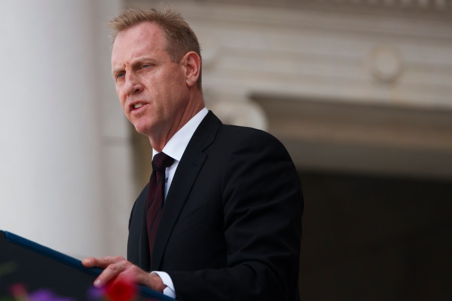 U.S. Acting Secretary of Defense Patrick Shanahan delivers remarks during a Memorial Day ceremony at Arlington National Cemetery on May 27, 2019. (Credit: Tom Brenner/Getty Images)