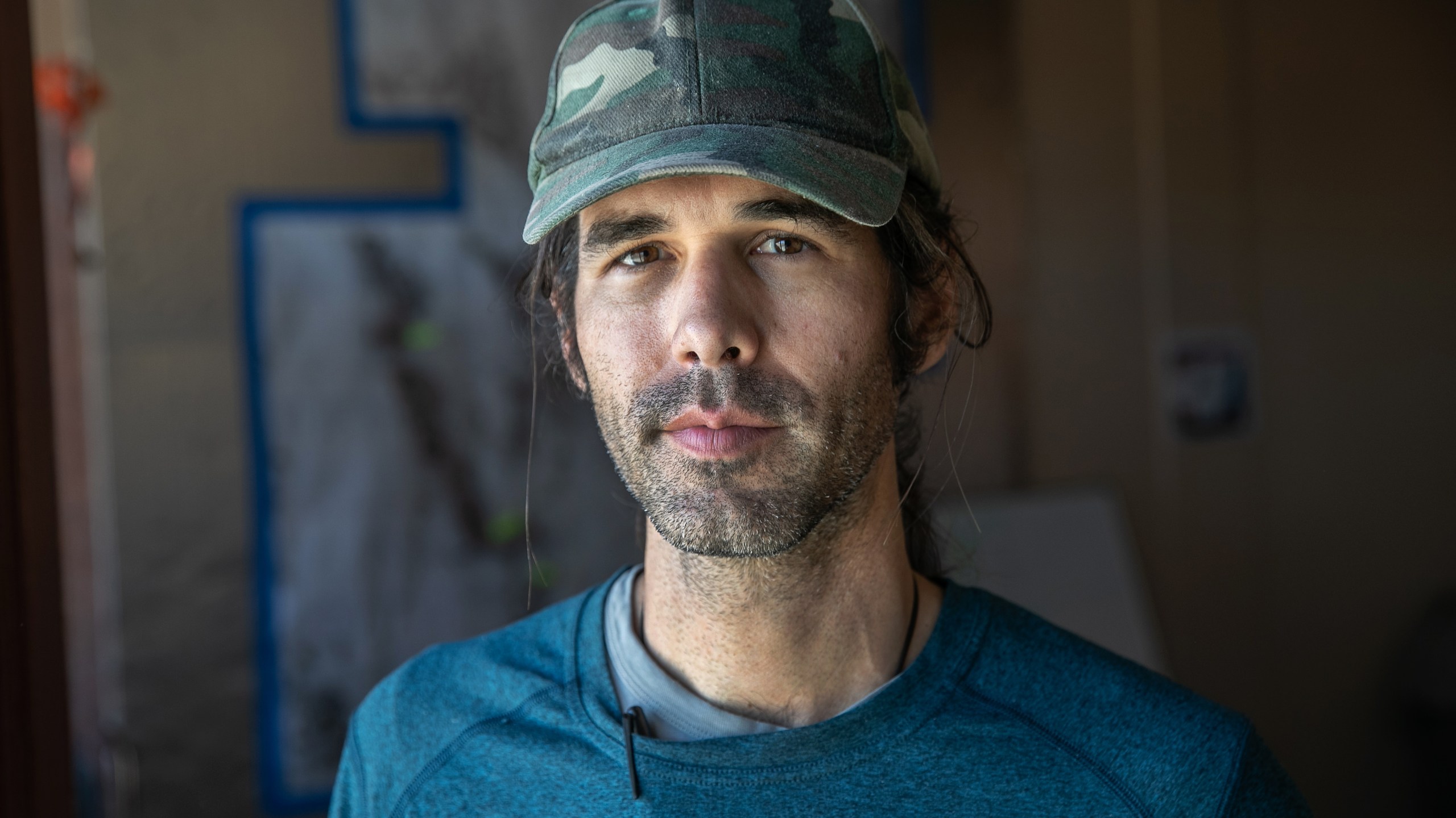 Scott Warren, a volunteer for the humanitarian aid group No More Deaths stands in the group's office on May 11, 2019, in Ajo, Arizona. (Credit: John Moore/Getty Images)