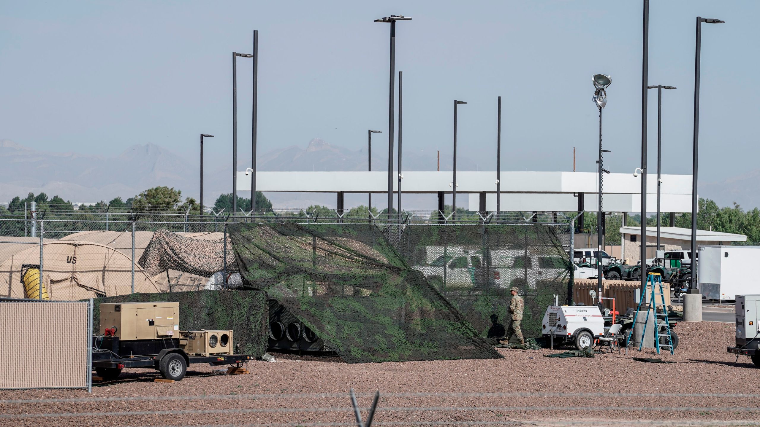 Military tents used to house migrants are pictured at the U.S.Customs and Border Protection facility is seen in Clint, Texas, on June 26, 2019. -The site held about 250 children in crowded cells, with limited sanitation and medical attention, as reported by a group of lawyers able to tour the facility under the Flores Settlement. (Credit: PAUL RATJE/AFP/Getty Images)