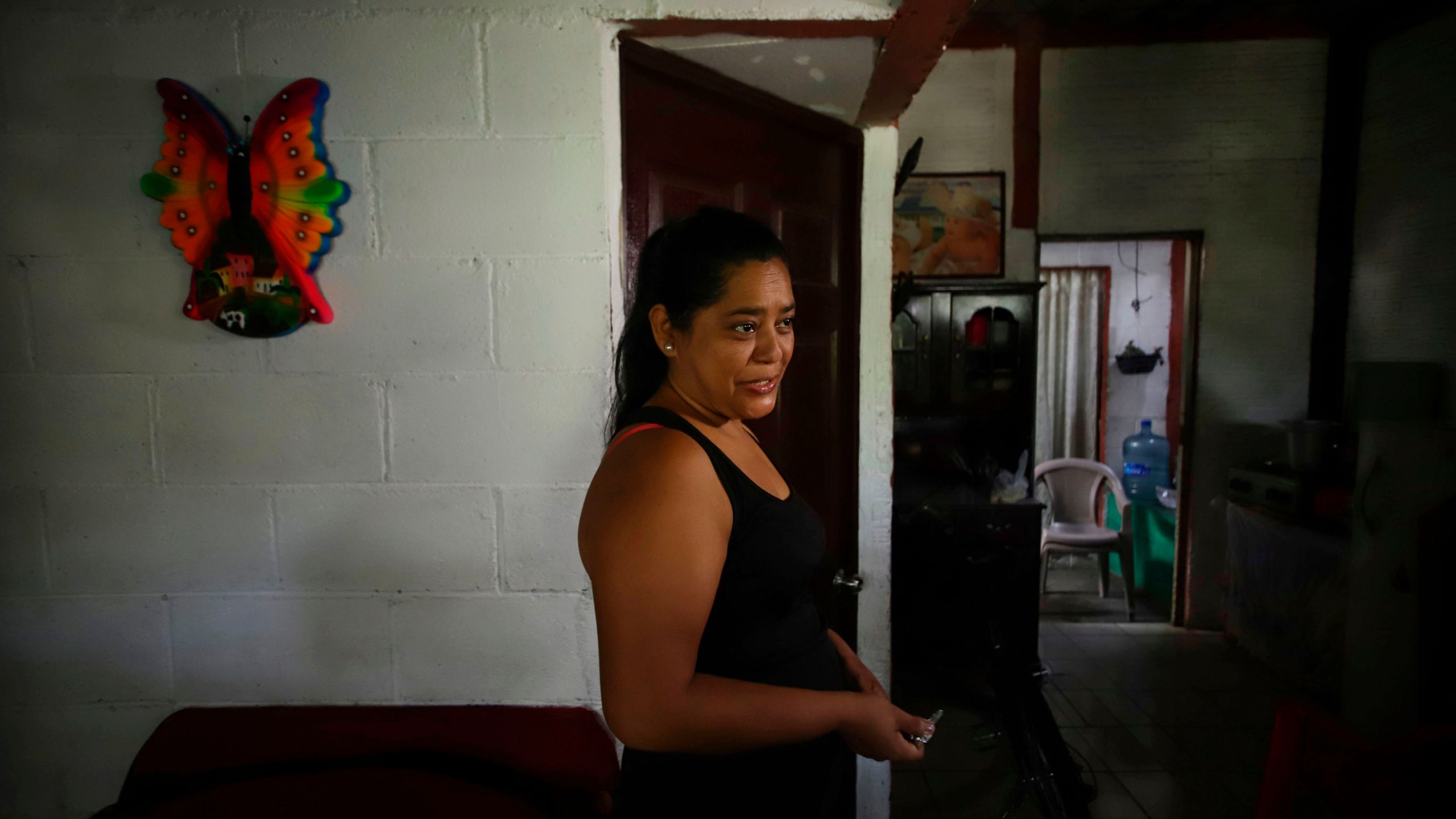 Salvadoran Rosa Ramirez speaks at her home in the populous Alta Vista neighborhood of San Martin, San Salvador municipality, El Salvador, on June 26, 2019. (Credit: Diego Lopez / AFP / Getty Images)