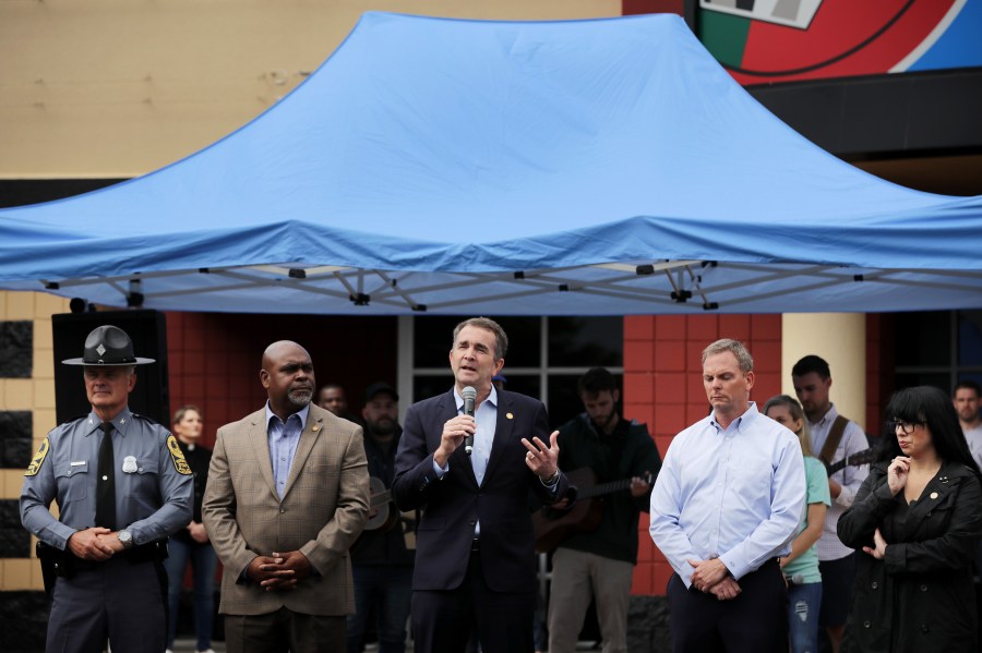 Gov. Ralph Northam, center, speaks during a public prayer service for mass shooting victims in Virginia Beach on June 1, 2019. (Credit: Chip Somodevilla/Getty Images)