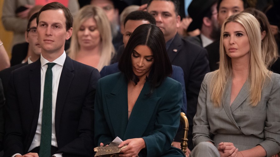 Kim Kardashian(C), Ivanka Trump and Jared Kushner listen as US President Donald Trump speaks about second chance hiring and criminal justice reform in the East Room of the White House in Washington, DC, June 13, 2019. (Credit: Saul Loeb/AFP/Getty Images)