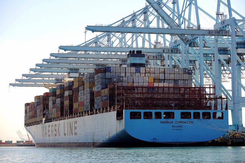 cargo is unloaded from a Maersk ship at the terminal. (Christina House / Los Angeles Times)