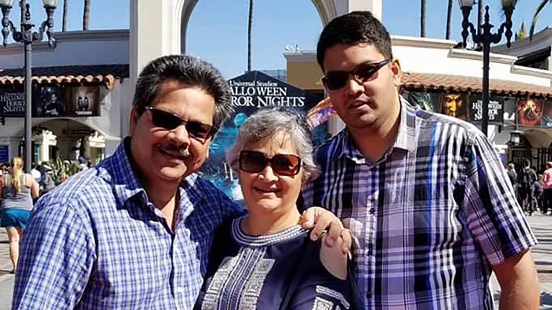 Shooting victim Kenneth French (right) and his parents, Russell and Paola French. (Credit: Courtesy Rick Shureih via CNN Wire)