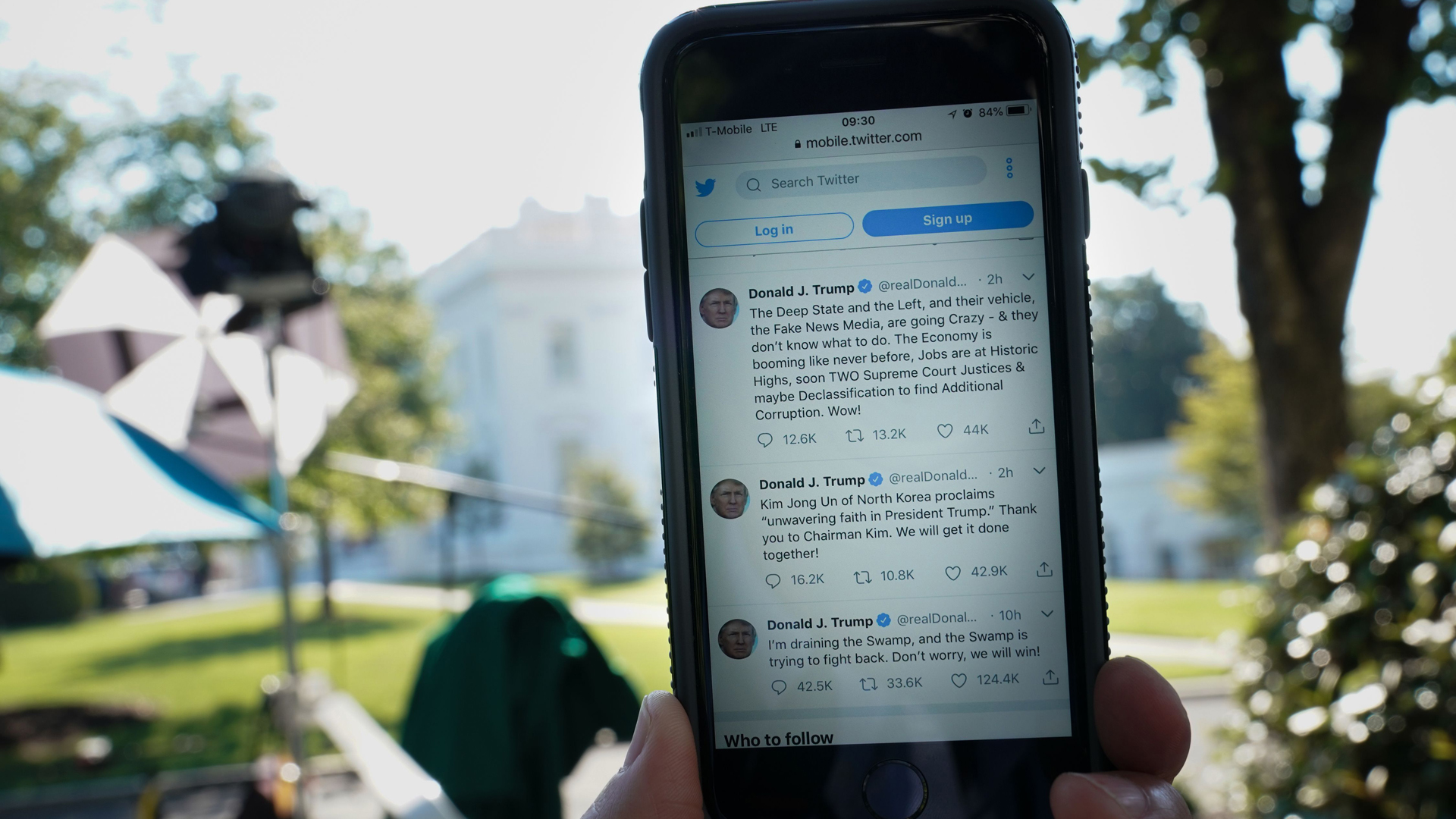 A September 6, 2018 illustration shows tweets from President Donald Trump in response to an editorial in the New York Times, outside of the White House. (Credit: MANDEL NGAN/AFP/Getty Images)