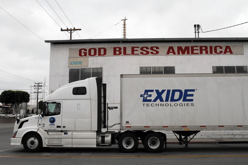 An Exide truck waits for traffic outside the battery recycling plant in Vernon in this file photo. (Credit: Bob Chamberlin / Los Angeles Times)