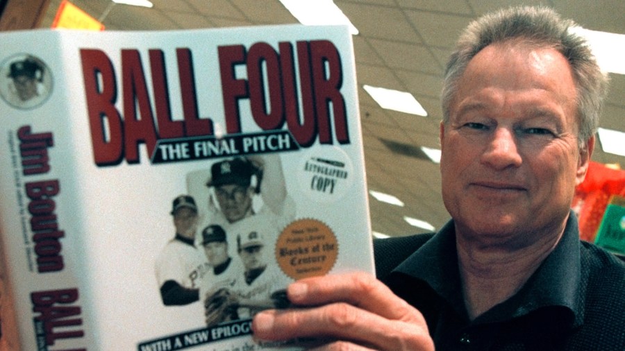 Former New York Yankees pitcher Jim Bouton signs copies of his new book, "Ball Four: The Final Pitch" November 27, 2000 at a Waldenbooks store in Schaumburg, IL. (Credit: Tim Boyle/Newsmakers)