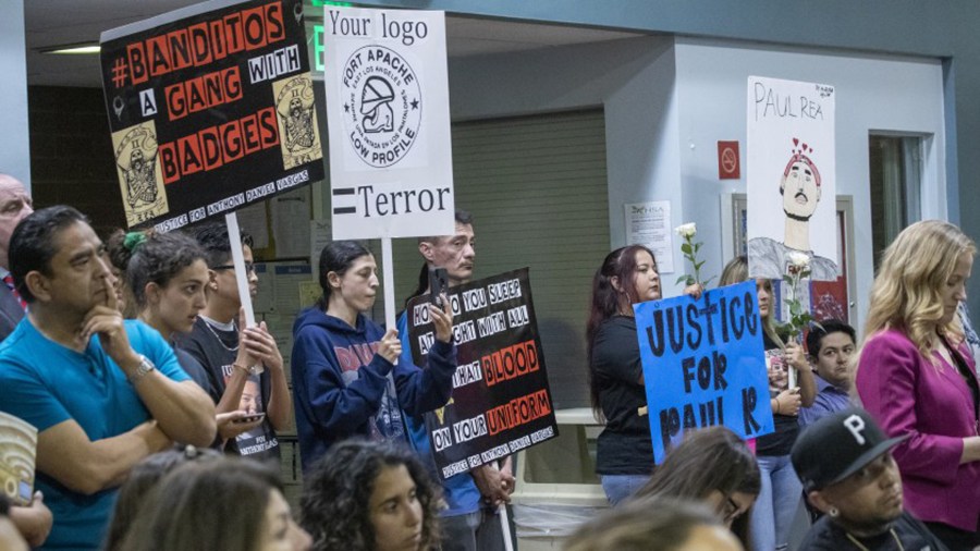 Members of the public speak out about the Banditos, a group of tattooed deputies at the Sheriff’s Department’s East Los Angeles Station, at a town hall hosted by the Sheriff Civilian Oversight Commission on July 11. Some people also criticized the logo of the station, featuring a boot and a riot helmet with the term “Fort Apache,” a label some view as offensive.(Credit: Allen J. Schaben / Los Angeles Times)