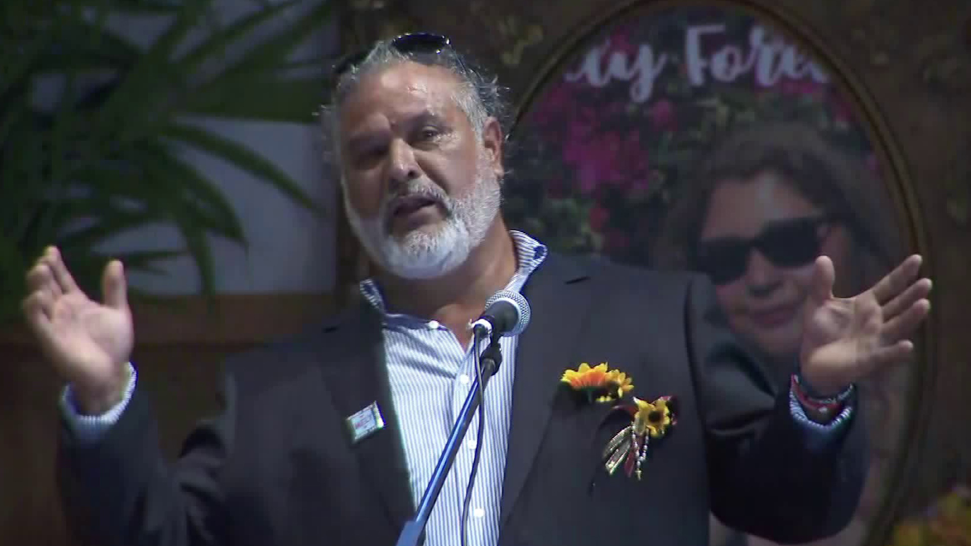 Albert Corado, whose daughter Melyda was fatally shot during a police shootout outside a Trader Joe's store in Silver Lake, speaks before a memorial service on July 19, 2019, a year after her death. (Credit: KTLA)