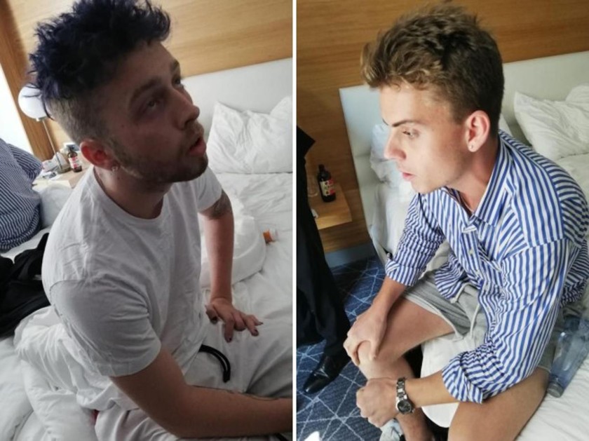 In this combo photo released by Italian Carabinieri, Finnegan Lee Elder, left, and Gabriel Christian Natale Hjorth sit in their hotel room in Rome in July 2019. (Credit: Italian Carabinieri/AP via CNN)