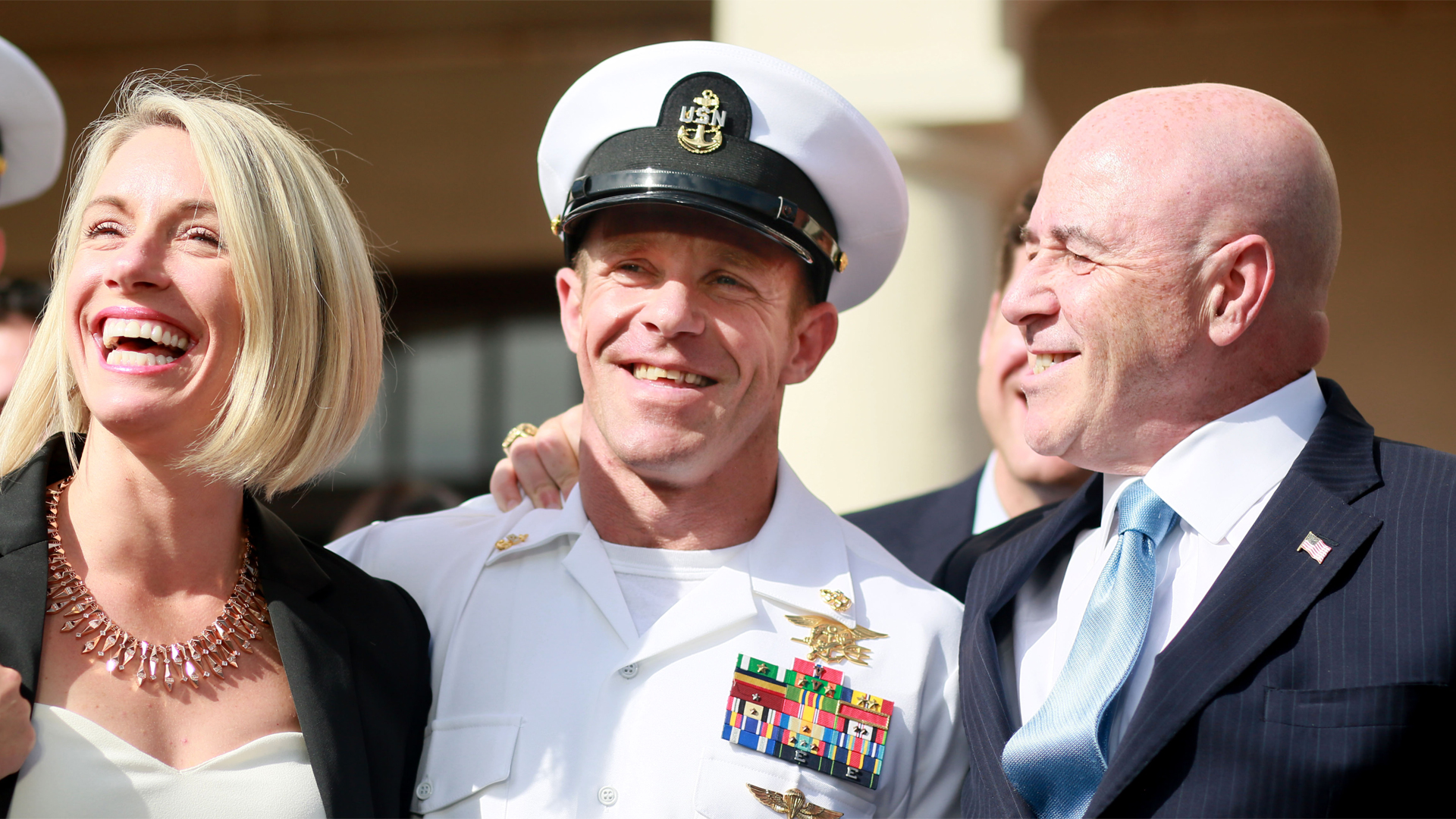 Navy Special Operations Chief Edward Gallagher celebrates with his wife Andrea after being acquitted of premeditated murder at Naval Base San Diego July 2, 2019, in San Diego. (Credit: Sandy Huffaker/Getty Images)