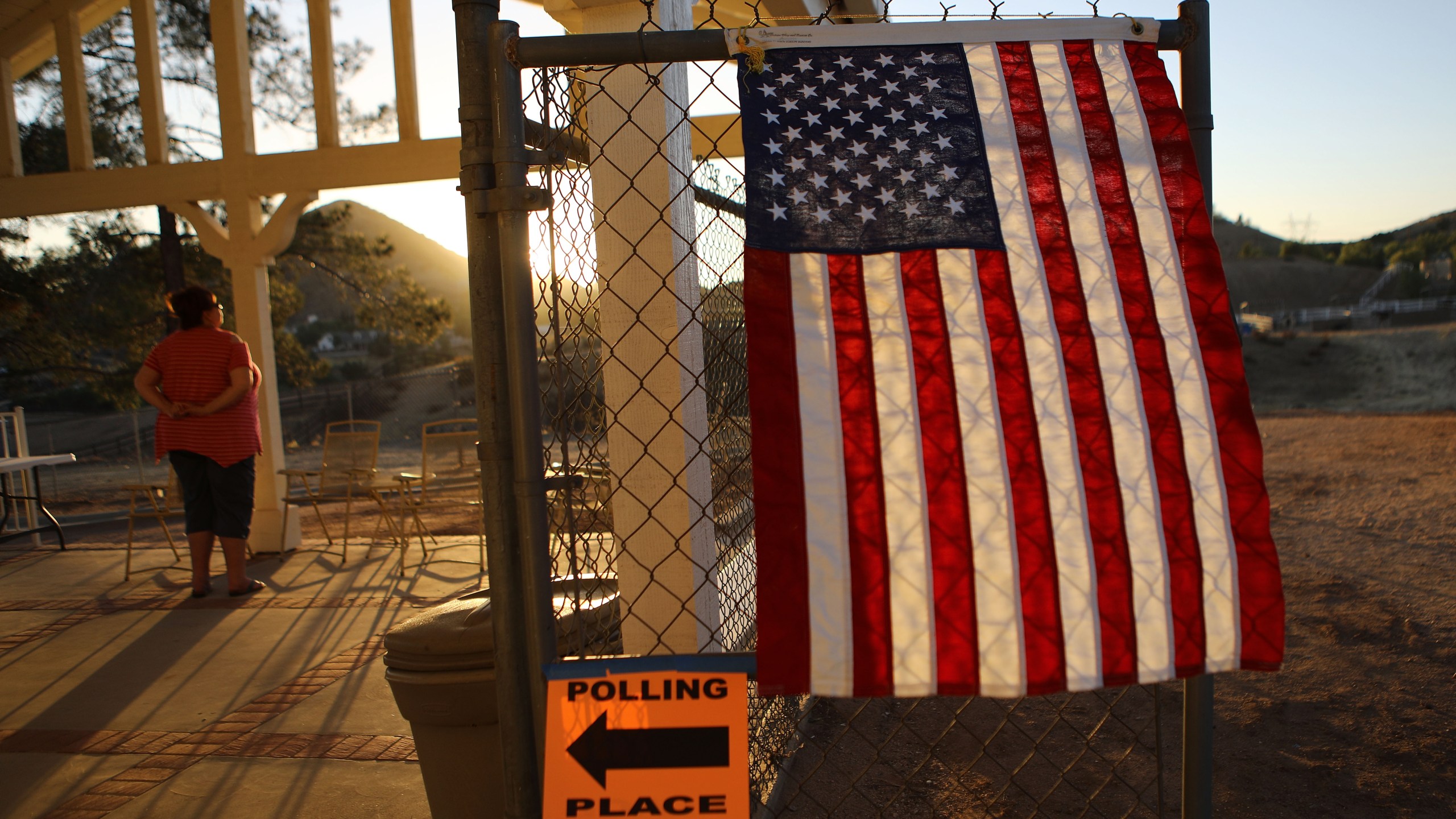 A voter takes in the view outside a polling place after casting her ballot in California's 25th Congressional district on Nov. 6, 2018 in Agua Dulce, California. (Credit: Mario Tama/Getty Images)