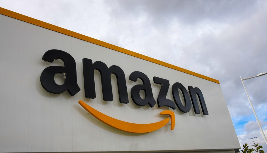 A picture shows the Amazon logo at the entrance area of the Amazon logistics centre in Lauwin-Planque, northern France, on March 4, 2019. (Credit: DENIS CHARLET / AFP/Getty Images)