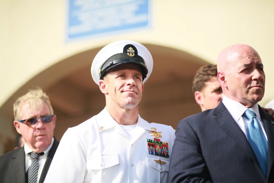 Navy Special Operations Chief Edward Gallagher celebrates after being acquitted of premeditated murder at Naval Base San Diego July 2, 2019. (Credit: Sandy Huffaker/Getty Images)