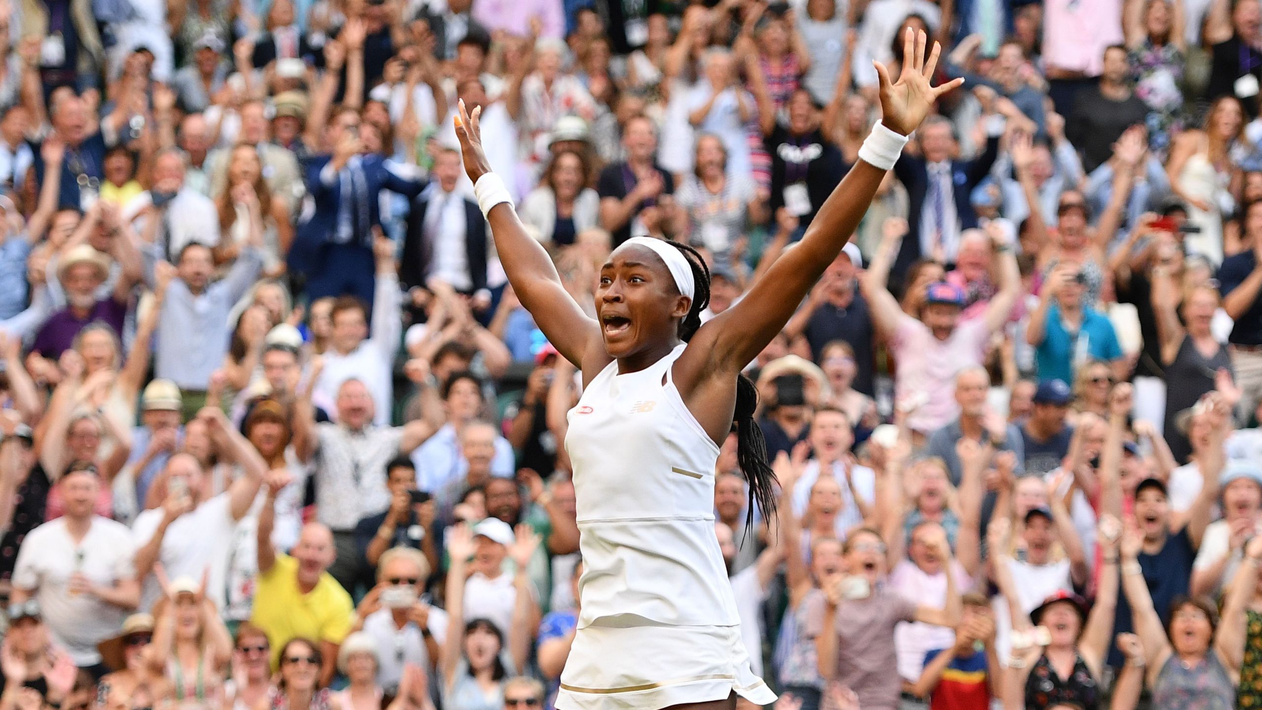 U.S. player Cori Gauff celebrates beating Slovenia's Polona Hercog during their women's singles third round match on the fifth day of the 2019 Wimbledon Championships at The All England Lawn Tennis Club in Wimbledon, southwest London, on July 5, 2019. (Credit: DANIEL LEAL-OLIVAS/AFP/Getty Images)