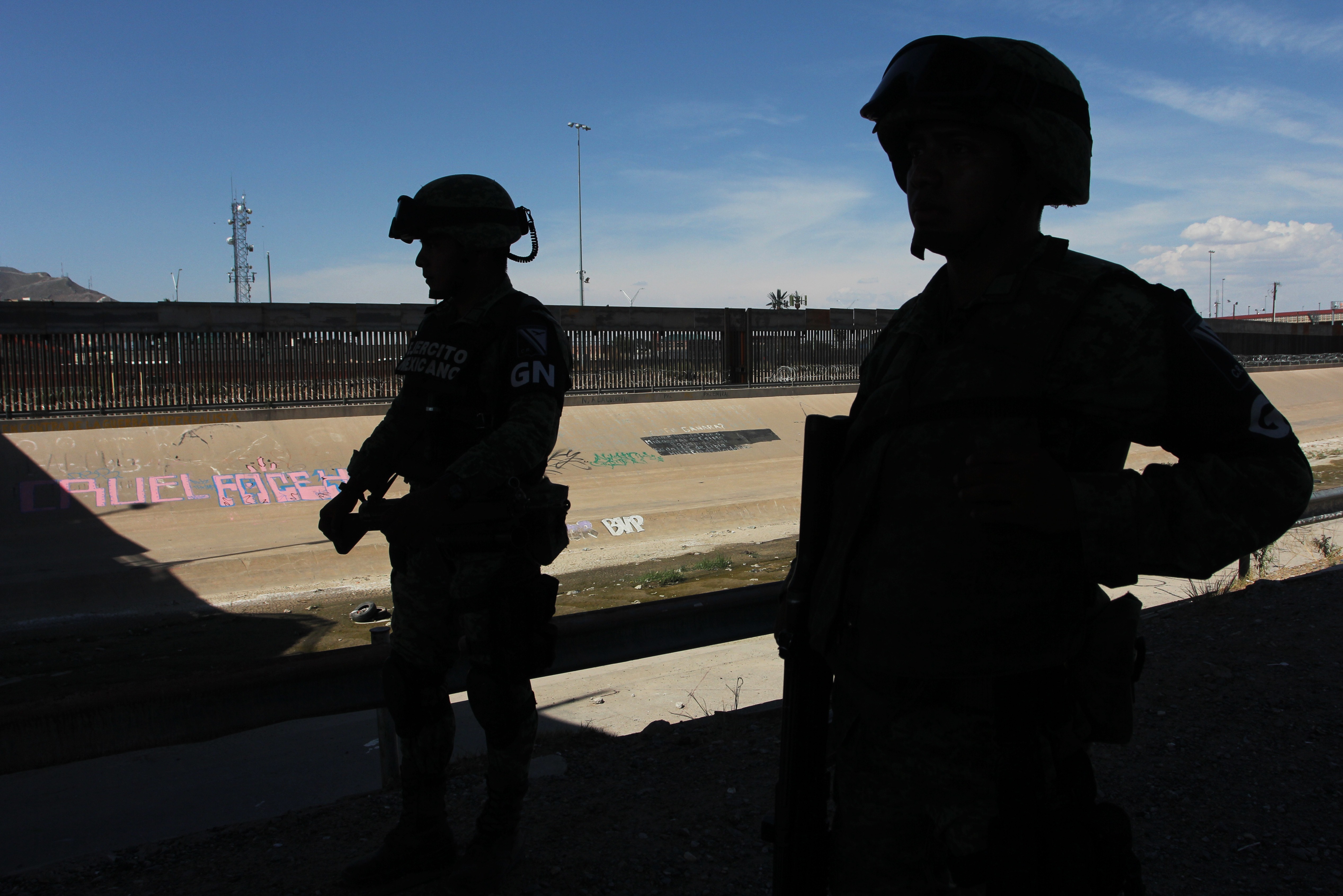 Members of the Mexican National Guard patrol the banks of the Rio Bravo river in Ciudad Juarez, Chihuahua state, Mexico, to prevent illegal crossings across the border river to El Paso Texas on July 15, 2019. (Credit: HERIKA MARTINEZ/AFP/Getty Images)