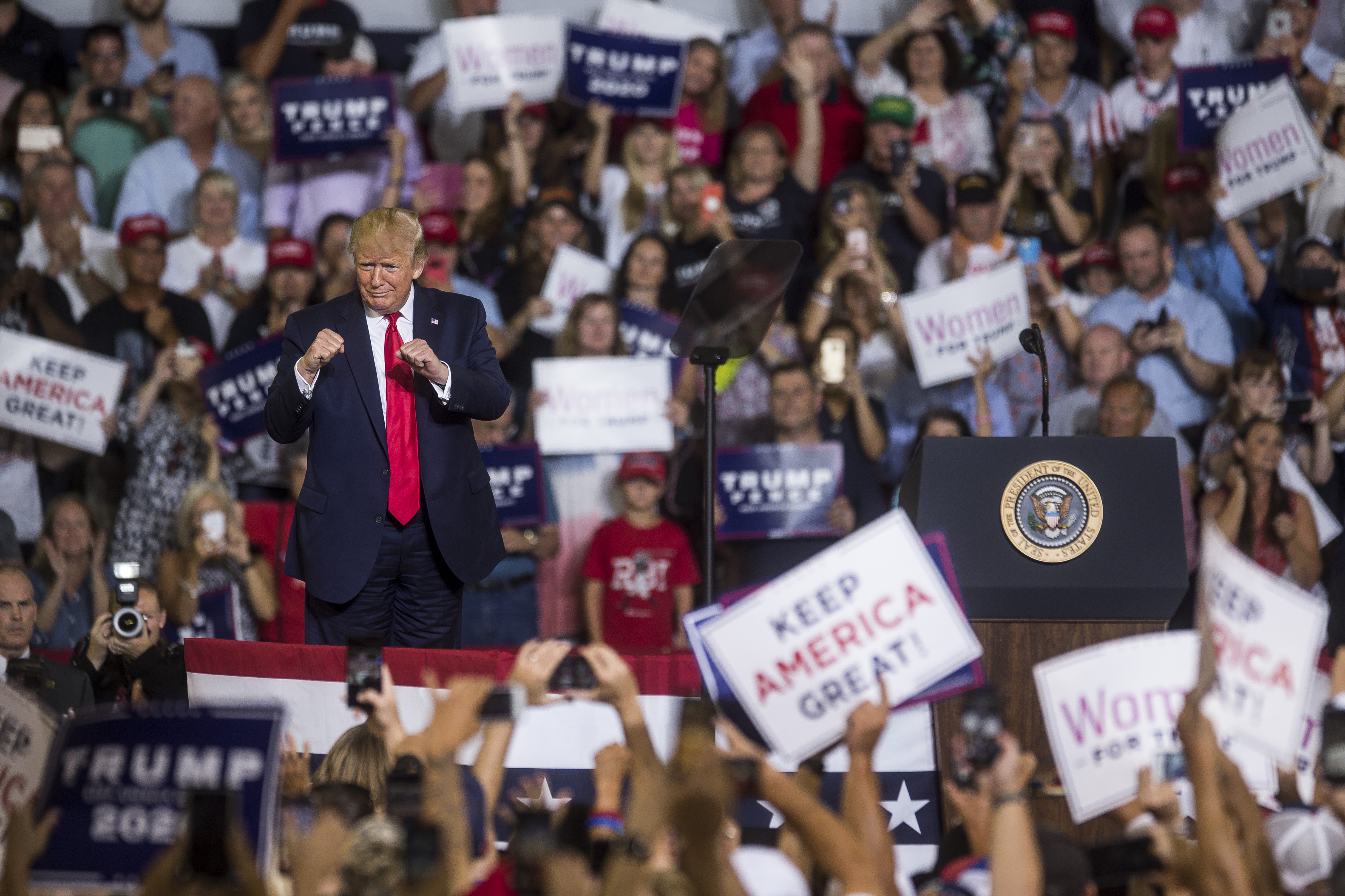 President Donald Trump takes the podium before speaking during a campaign rally in Greenville, North Carolina, on July 17, 2019. (Credit: Zach Gibson / Getty Images)