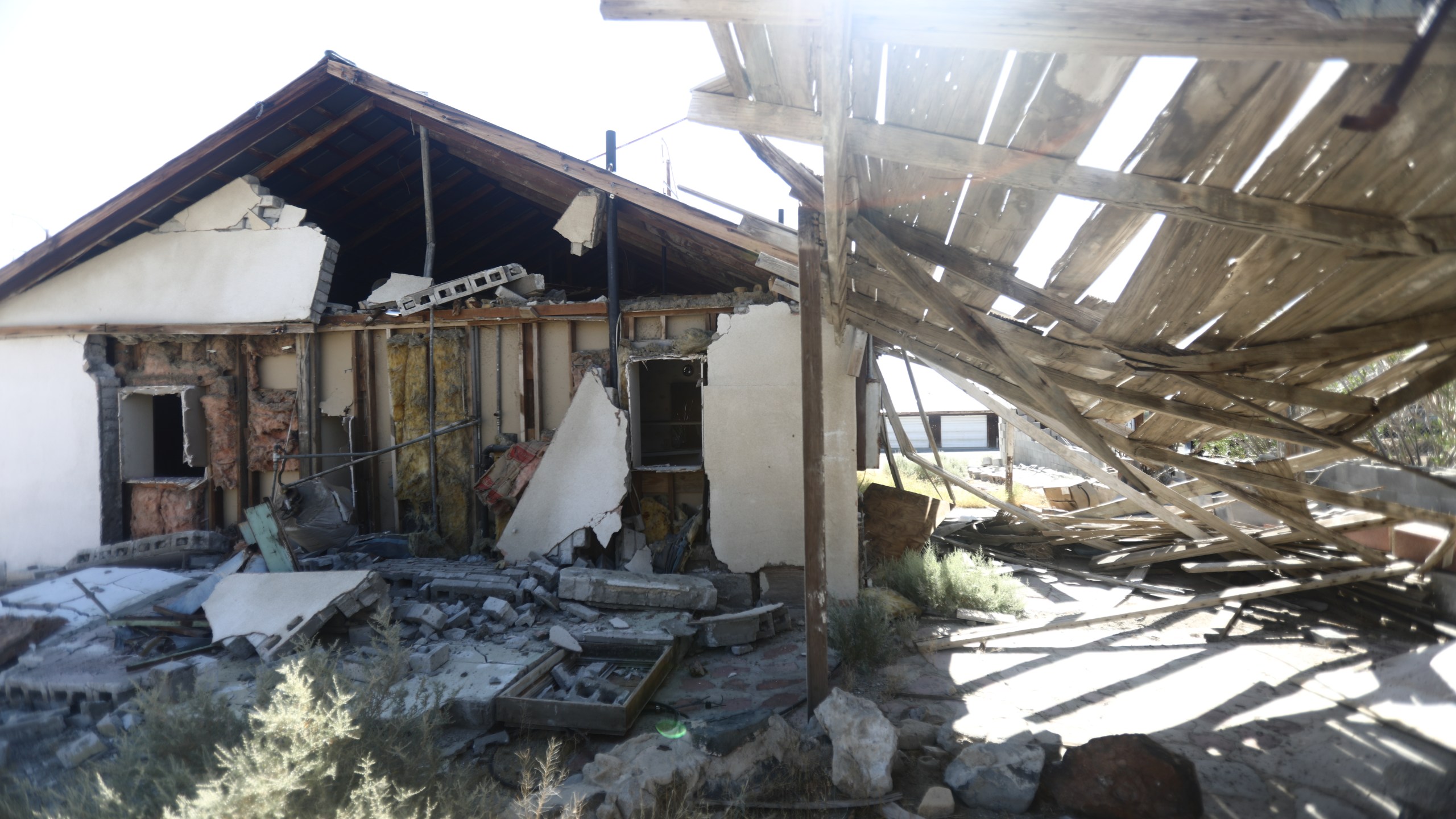 A house is damaged after a 7.1 magnitude earthquake struck in the area on July 6, 2019, in Trona, Calif. (Credit: Mario Tama/Getty Images)