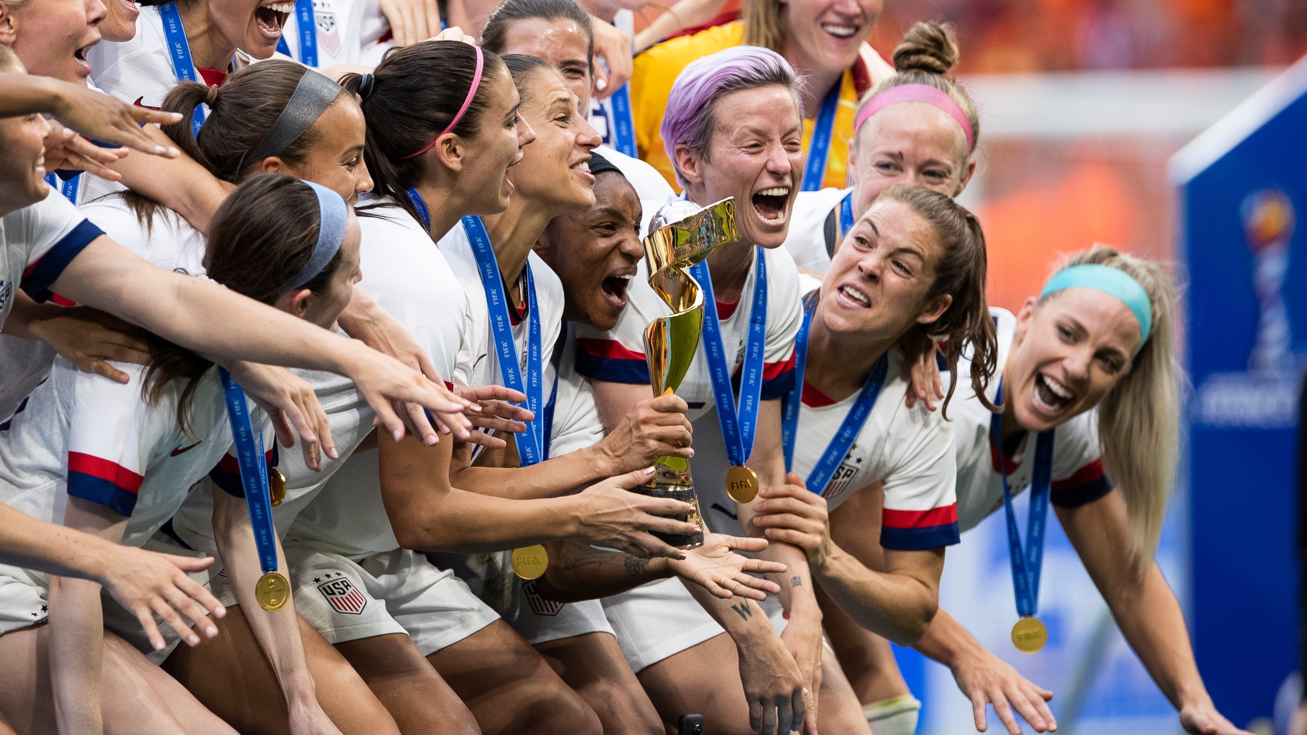 Players of the U.S. Women's National Team celebrate with their trophy after winning the 2019 FIFA Women's World Cup over the Netherlands in Lyon, France, on July 7, 2019. (Credit: Maja Hitij / Getty Images)