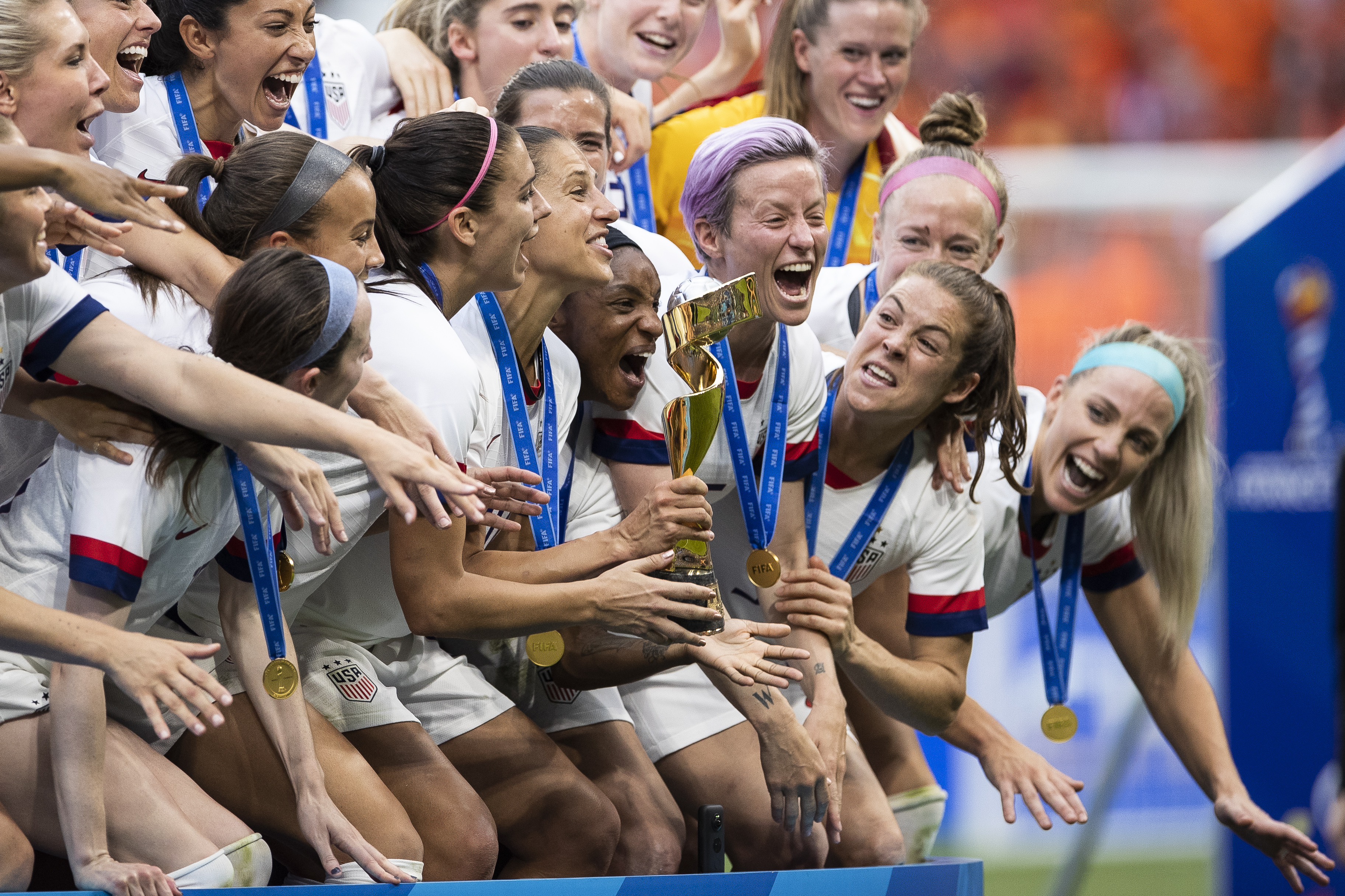 Players of the U.S. Women's National Team celebrate with their trophy after winning the 2019 FIFA Women's World Cup over the Netherlands in Lyon, France, on July 7, 2019. (Credit: Maja Hitij / Getty Images)