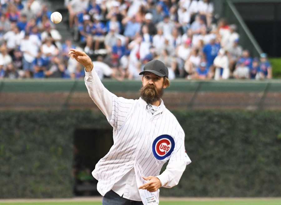 Alligator expert and trapper Frank Robb throws out a ceremonial first pitch before the game between the Chicago Cubs and the Cincinnati Reds at Wrigley Field on July 16, 2019. (Credit: David Banks/Getty Images)