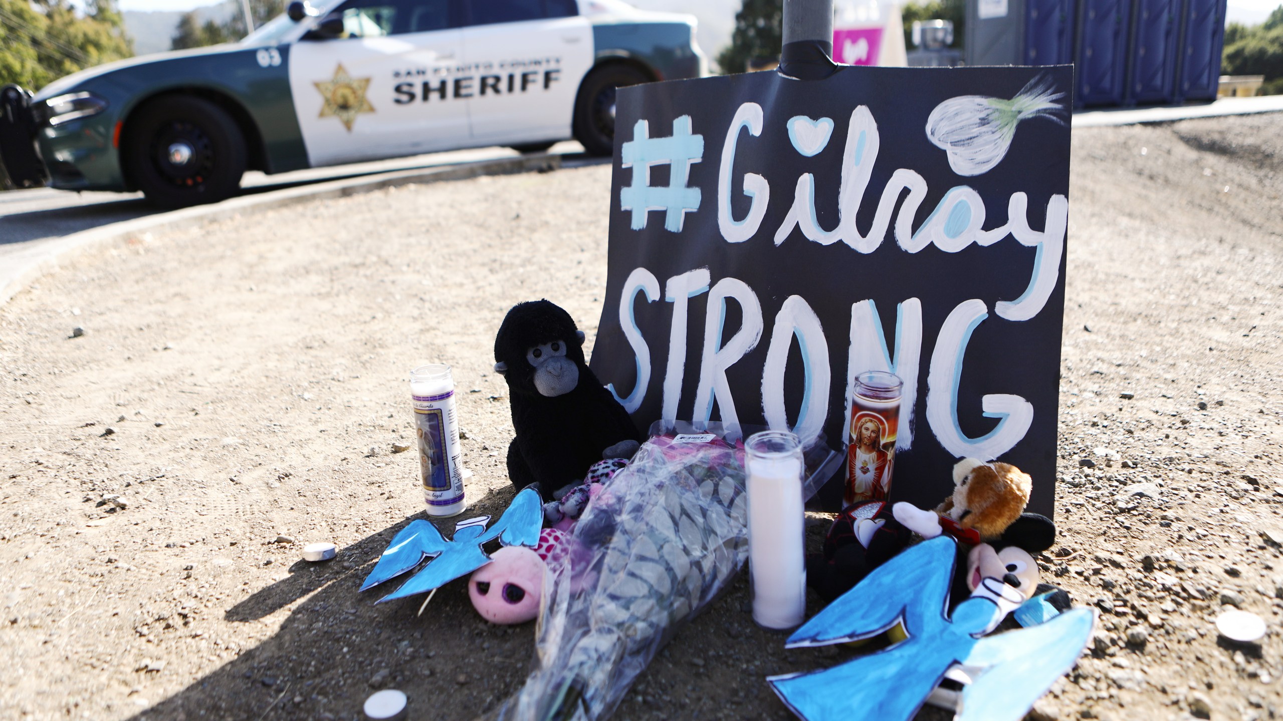 A makeshift memorial is seen outside the site of the Gilroy Garlic Festival, after a mass shooting took place at the event yesterday, on July 29, 2019 in Gilroy, California. Three victims were killed, two of them children, and at least a dozen were wounded before police officers killed the suspect. (Credit: Mario Tama/Getty Images)