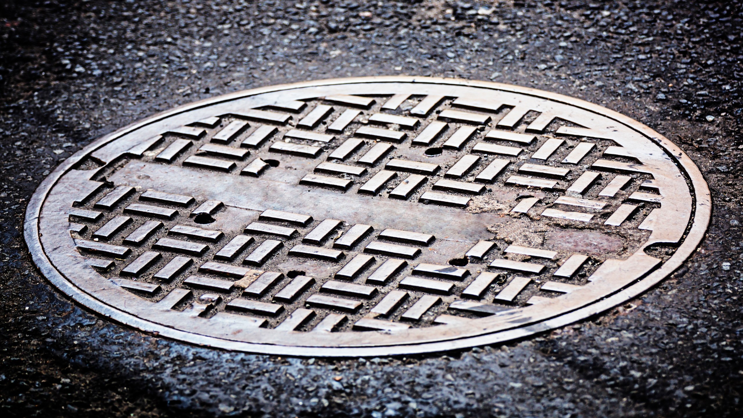 A manhole cover is seen in this file photo. (Credit: Getty Images)