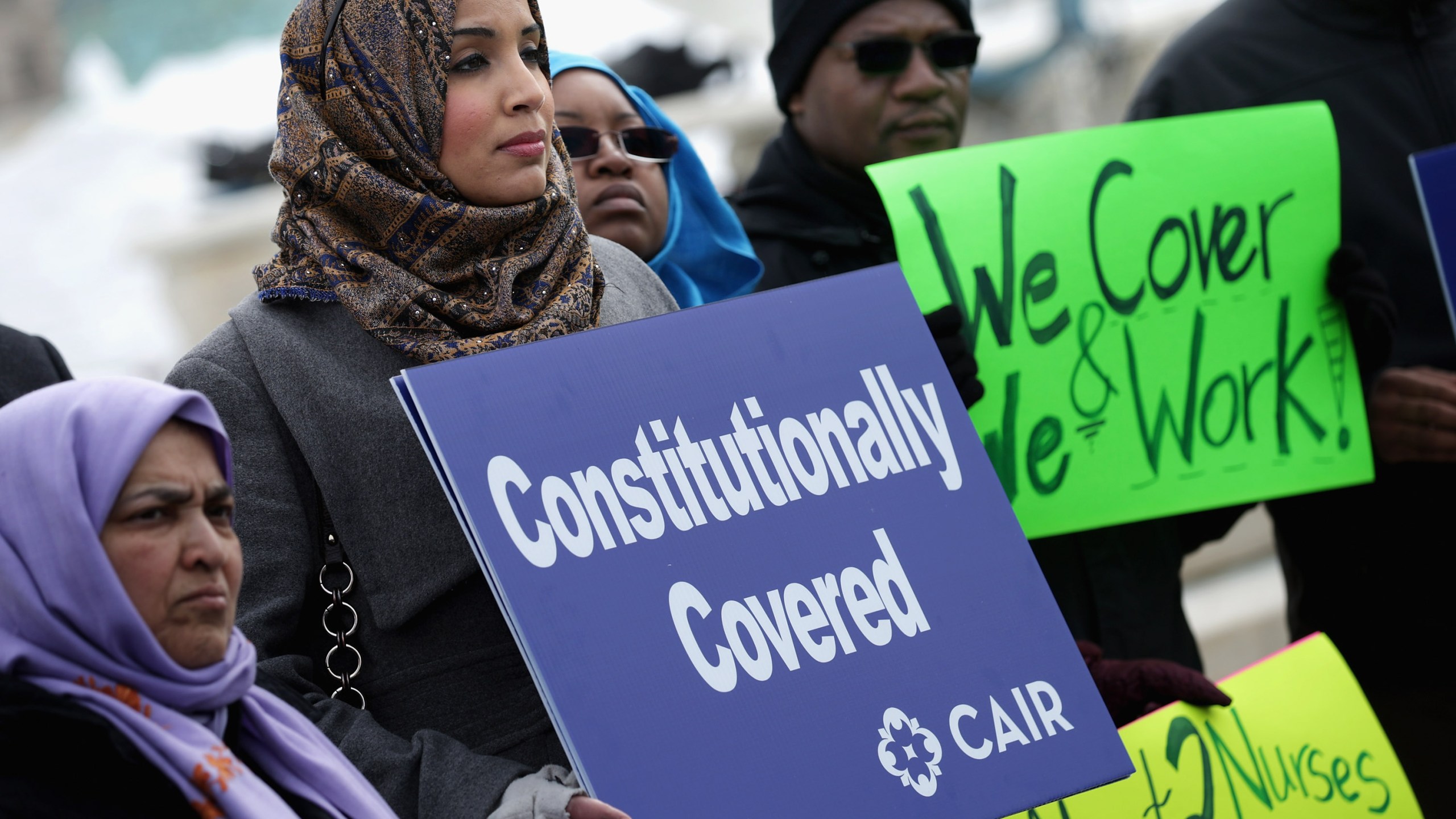 Zainab Chaudry (center) joins other supporters from The Council on American-Islamic Relations during a news conference outside the U.S. Supreme Court after the court heard oral arguments in EEOC v. Abercrombie & Fitch Feb. 25, 2015, in Washington, D.C. Samantha Elauf of Tulsa, Okla., filed a charge of religious discrimination with the Equal Employment Opportunity Commission saying Abercrombie & Fitch violated discrimination laws in 2008 by declining to hire her because she wore a head scarf, a custom of her Muslim faith. (Credit: Chip Somodevilla/Getty Images)