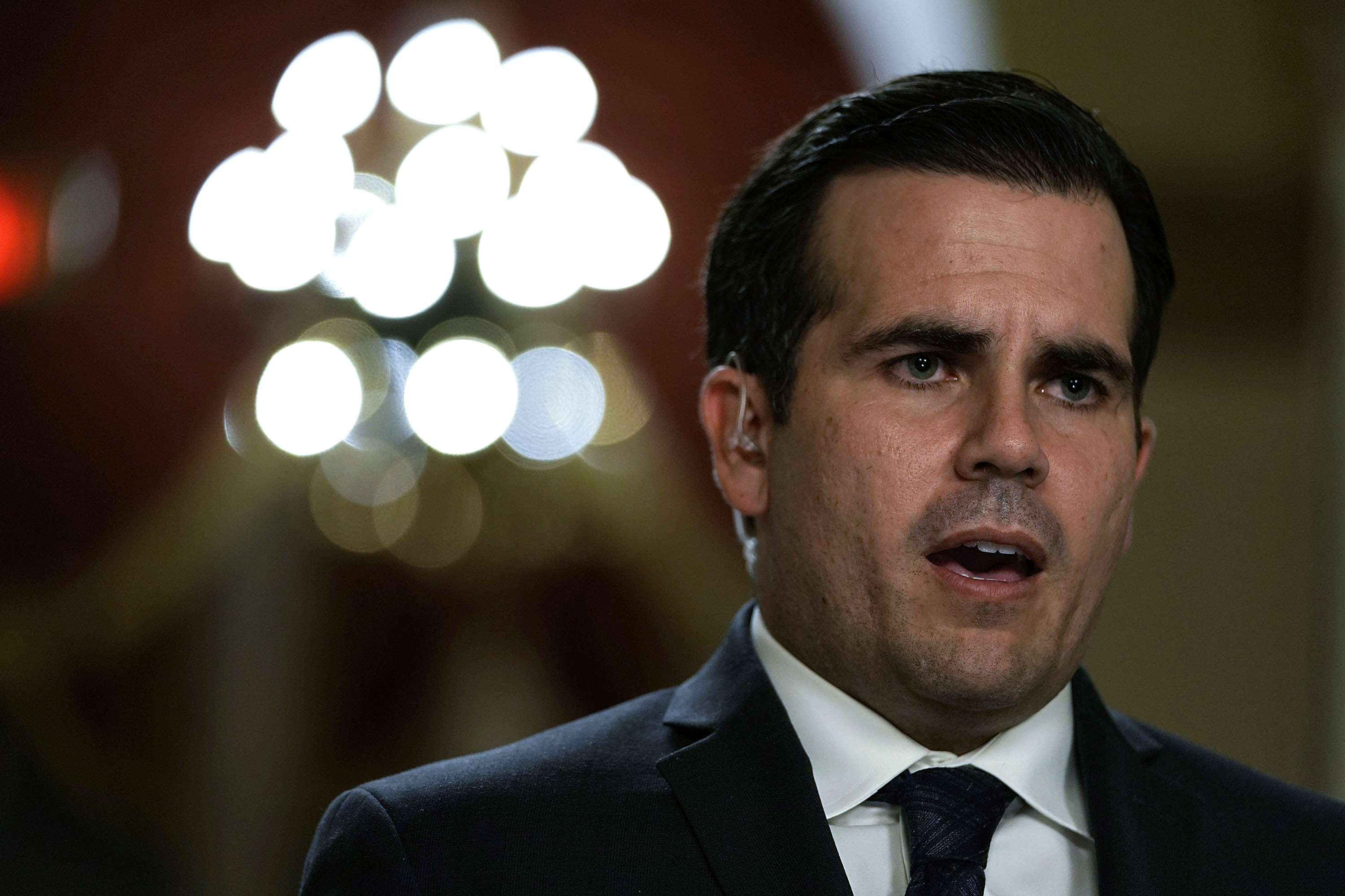 Puerto Rican Gov. Ricardo Rossello is interviewed by a TV channel after a House vote at the Capitol Dec. 21, 2017, in Washington, D.C. (Credit: Alex Wong/Getty Images)