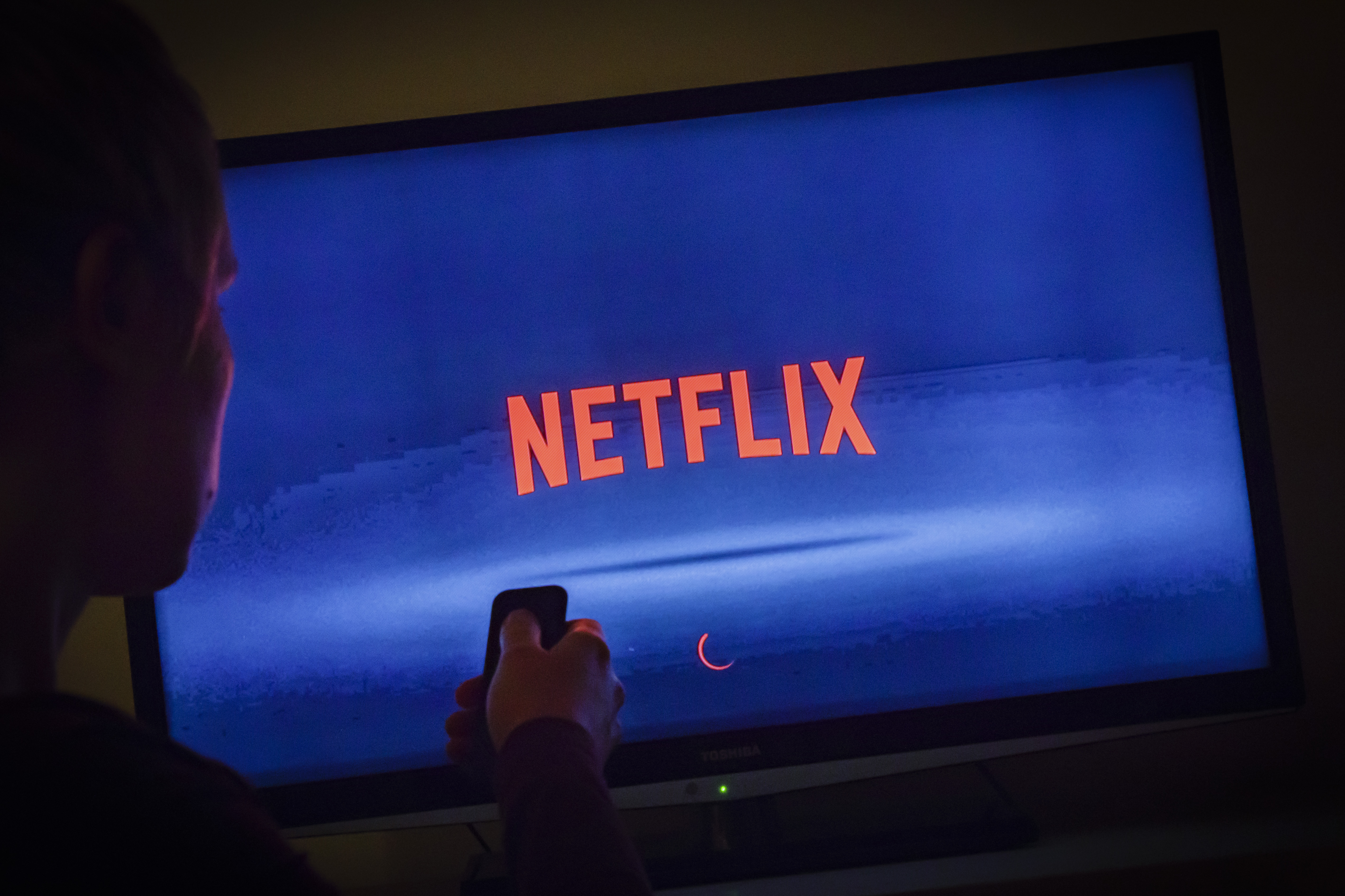 The Netflix logo can be seen on a TV on April 5, 2018. (Thomas Trutschel/Photothek via Getty Images)