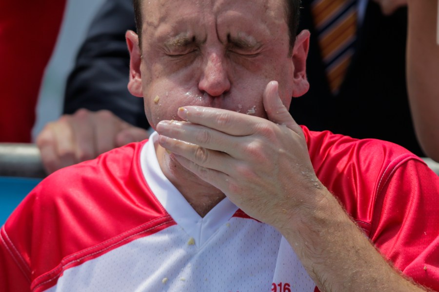 Joey Chestnut competes in the annual Nathan's Hot Dog Eating Contest on July 4, 2018 in the Coney Island neighborhood of the Brooklyn borough of New York City. (Credit: Eduardo Munoz Alvarez/Getty Images)