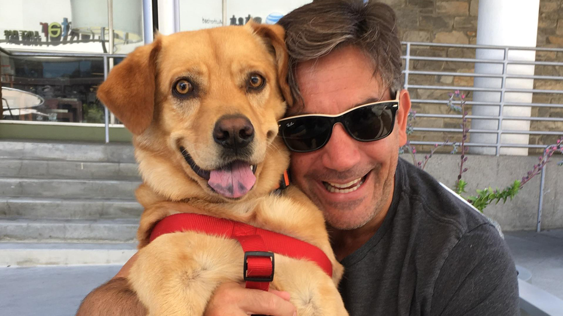 Gabriel Crispo, 49, is seen with his dog in an undated photo provided to KTLA by friends.