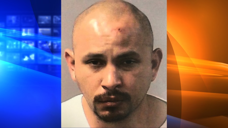 Isaac Manuel Orozco is seen in a booking photo released by the Kern County District Attorney's Office.