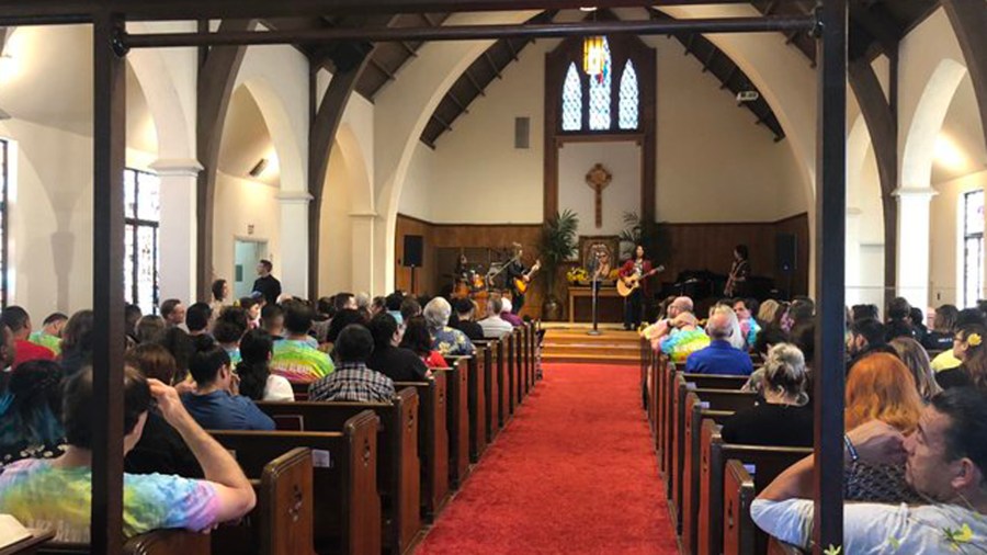 Mourners gathered at a Silver Lake church on July 21, 2019, to mark the anniversary of the killing of Mely Corado, who was shot during a gunfight between police and a shooting suspect at the Trader Joe's store where she worked as a manager. (Credit: KTLA)