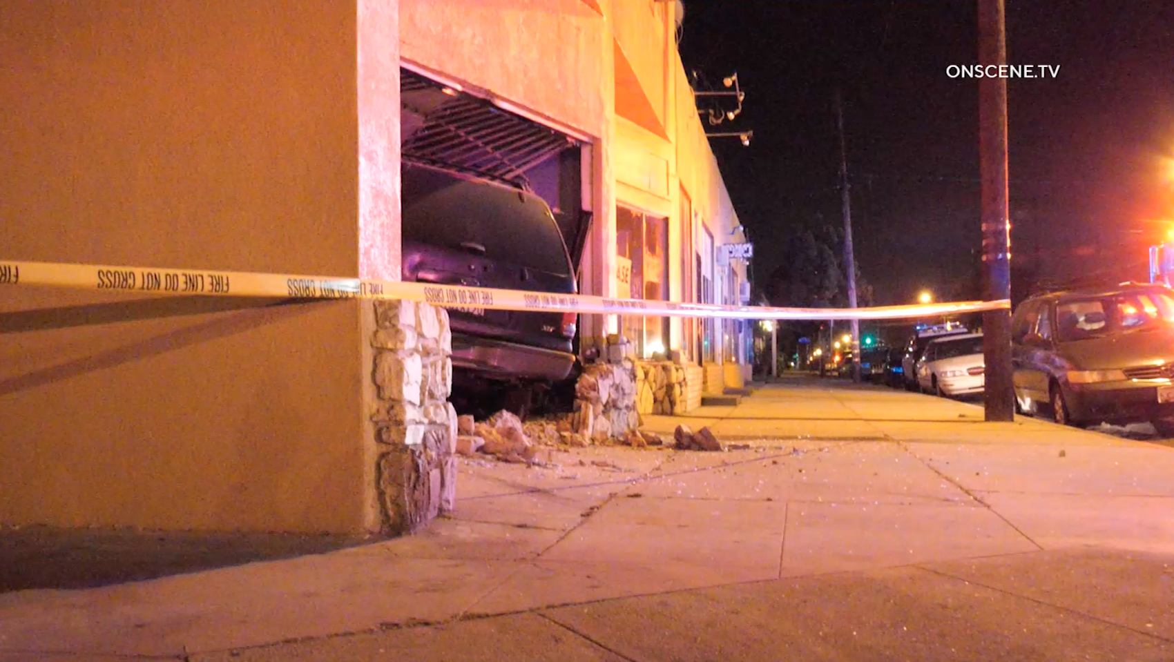 An SUV sits inside an apartment building after a crash on Aug. 1, 2019. (Credit: ONSCENE.TV)