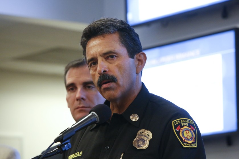 Los Angeles Fire Department Chief Ralph Terrazas and Mayor Eric Garcetti, left, are seen at a news conference in 2014. (Anne Cusack / Los Angeles Times)