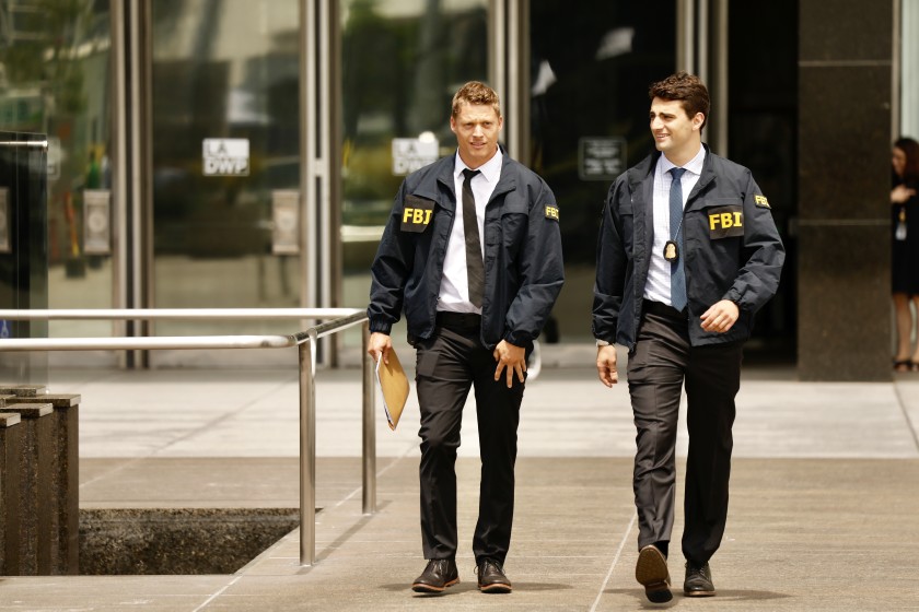 FBI agents leave the downtown headquarters of the Los Angeles Department of Water and Power after serving a search warrant on July 22.(Credit: Al Seib / Los Angeles Times)