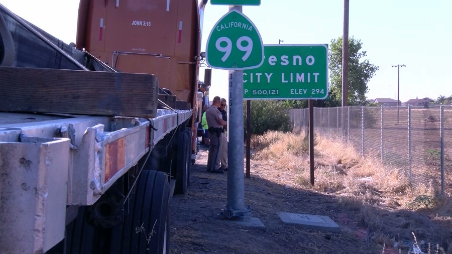 Officers investigate the scene in Fresno where one big rig driver stabbed two others on Aug. 28, 2019. (Credit: KGPE/KSEE via CNN)