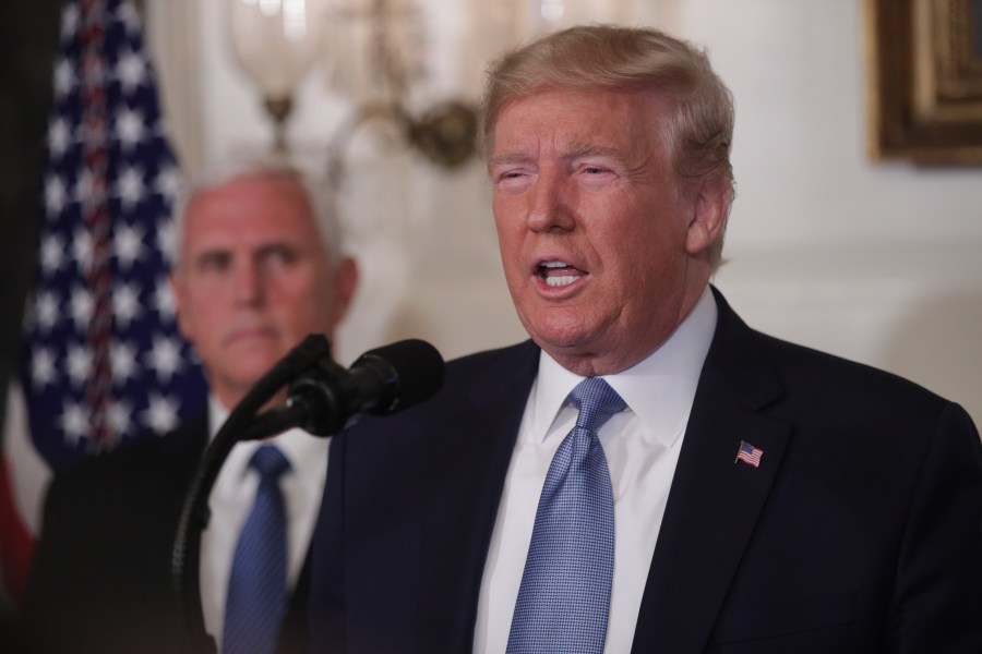 U.S. President Donald Trump makes remarks in the Diplomatic Reception Room of the White House as Vice President Mike Pence looks on Aug. 5, 2019, in Washington, D.C. (Credit: Alex Wong/Getty Images)