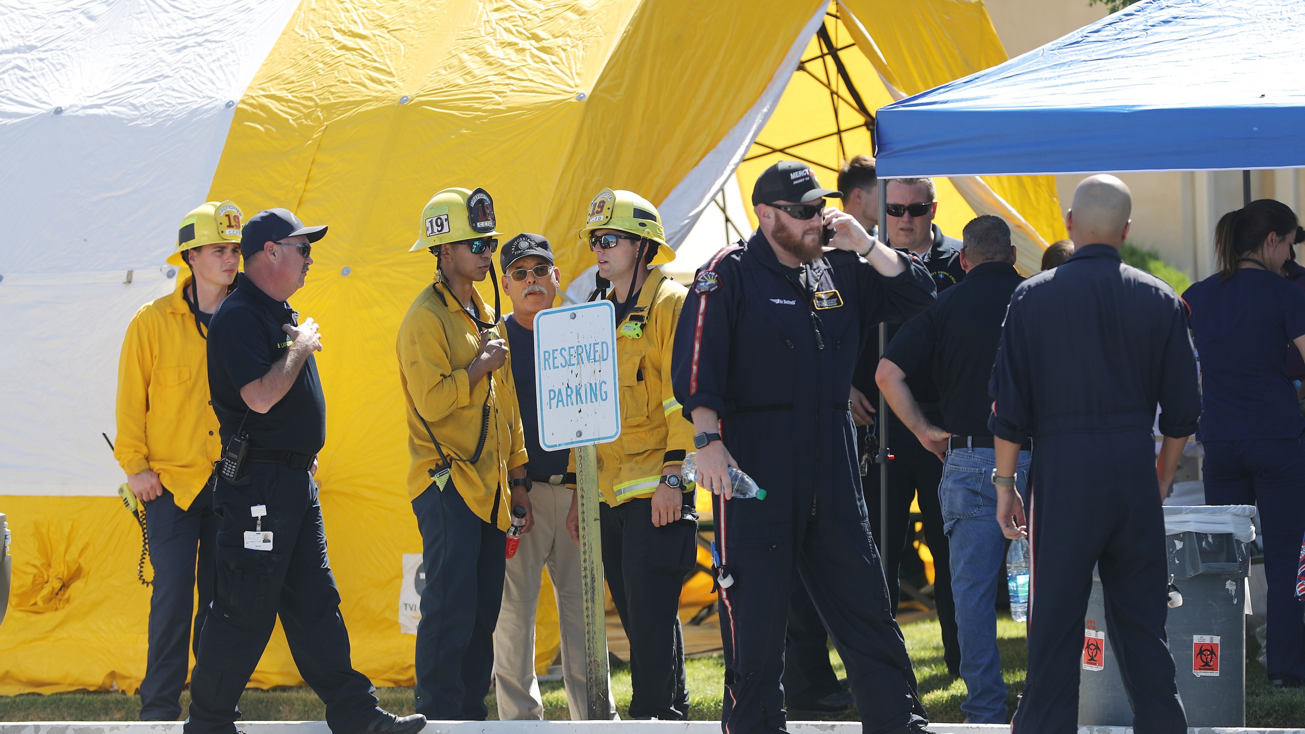 First responders gather in front of a tent set up outside Ridgecrest Regional Hospital after some patients were evacuated from the hospital following a 6.4 magnitude earthquake on July 4, 2019, in Ridgecrest, California. (Credit: Mario Tama/Getty Images)