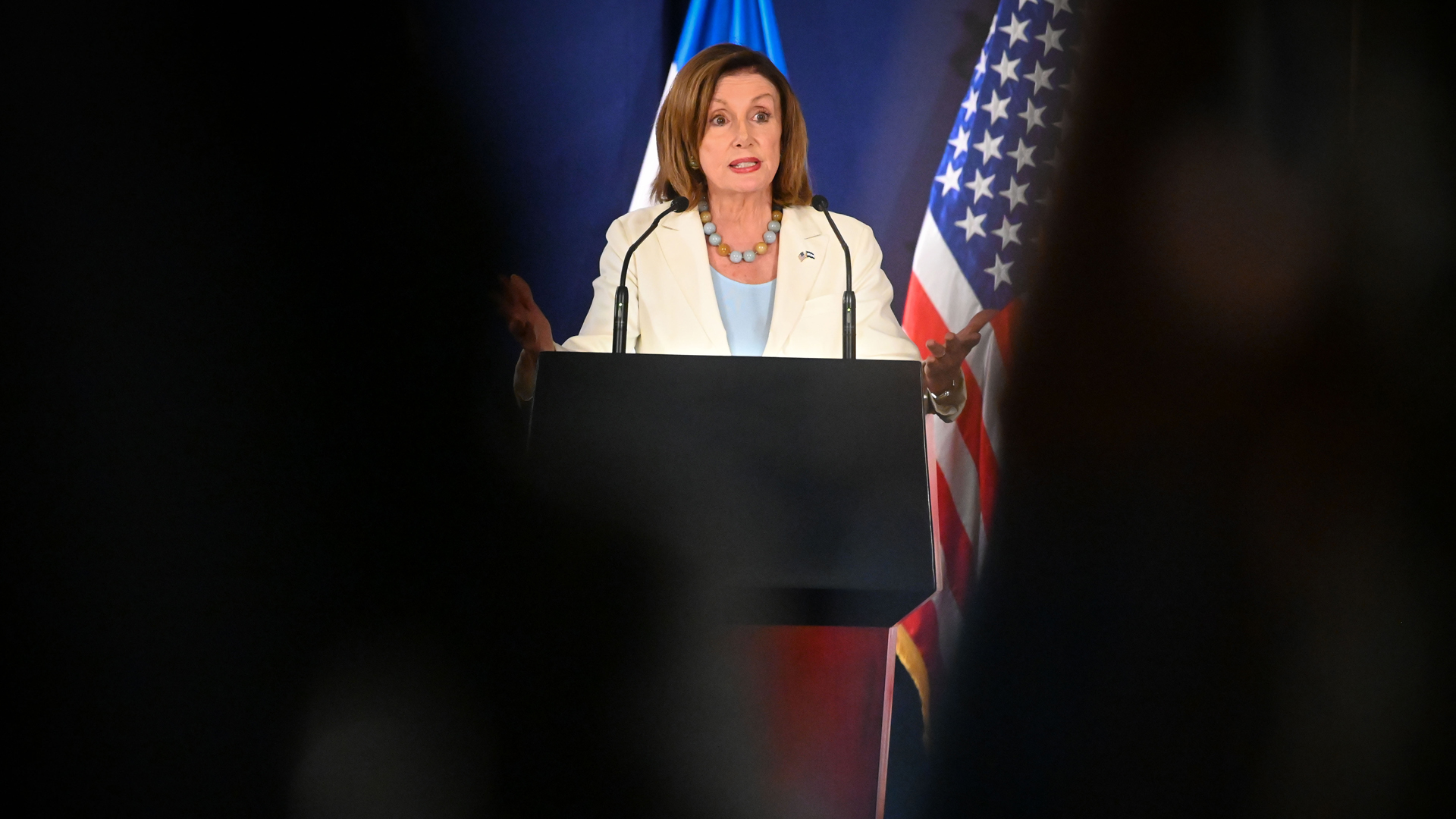 House Speaker Nancy Pelosi gestures during a press conference with El Salvador's President Nayib Bukele at the presidential palace in San Salvador, on Aug. 9, 2019. (Credit: OSCAR RIVERA/AFP/Getty Images)