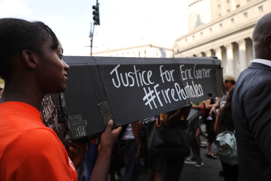 People participate in a protest to mark the five year anniversary of the death of Eric Garner during a confrontation with a police officer in the borough of Staten Island on July 17, 2019 in New York City. (Credit: Spencer Platt/Getty Images)