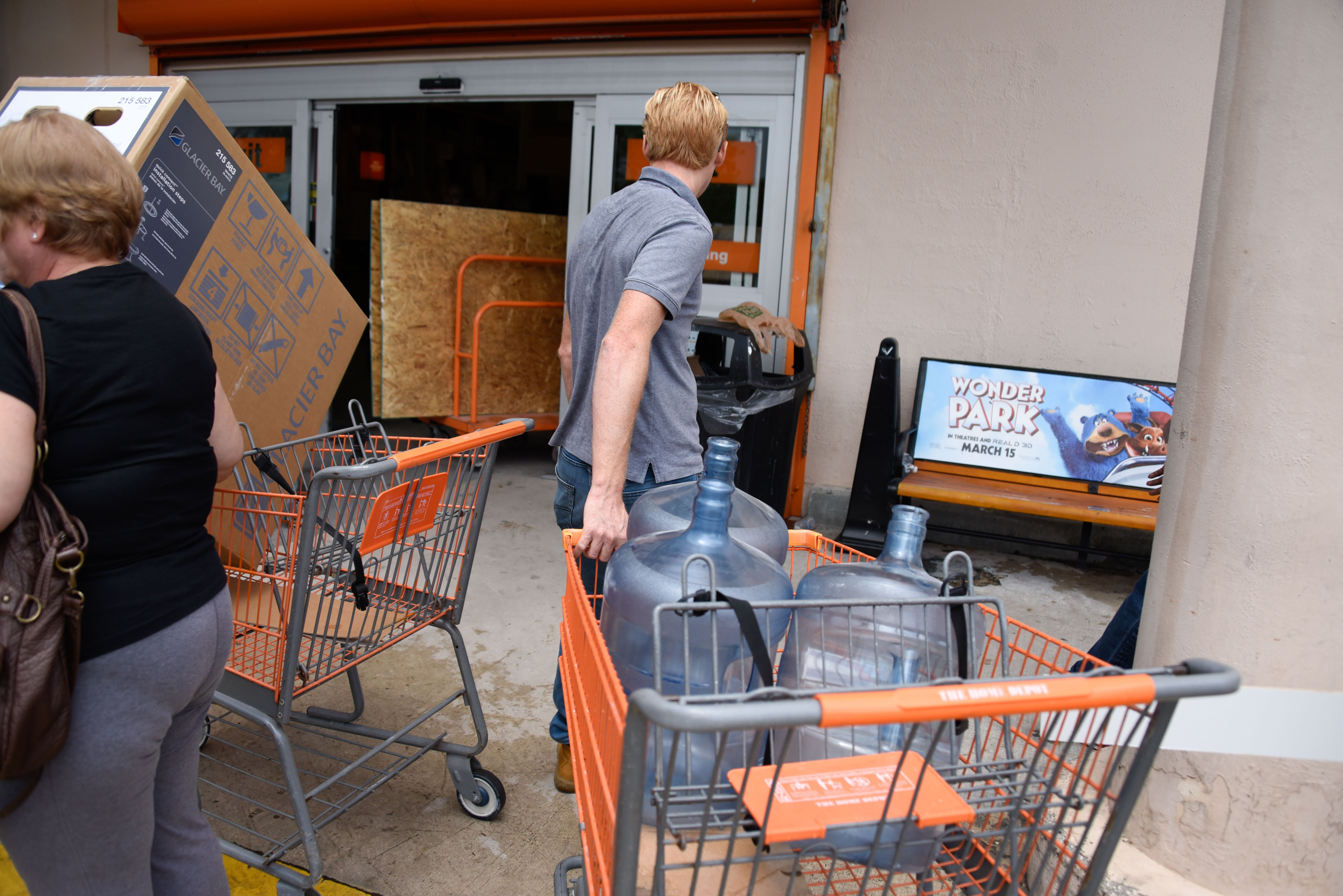 Residents are sighted at Home Depot where they are buying plywood and bottled water on August 29, 2019, as they prepare for Hurricane Dorian. (Credit: MICHELE EVE SANDBERG/AFP/Getty Images)